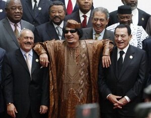 Gaddafi with Yemeni President Ali Abdullah Saleh (left) and Egyptian President Hosni Mubarak at the Afro-Arab summit in Sirte October 10, 2010